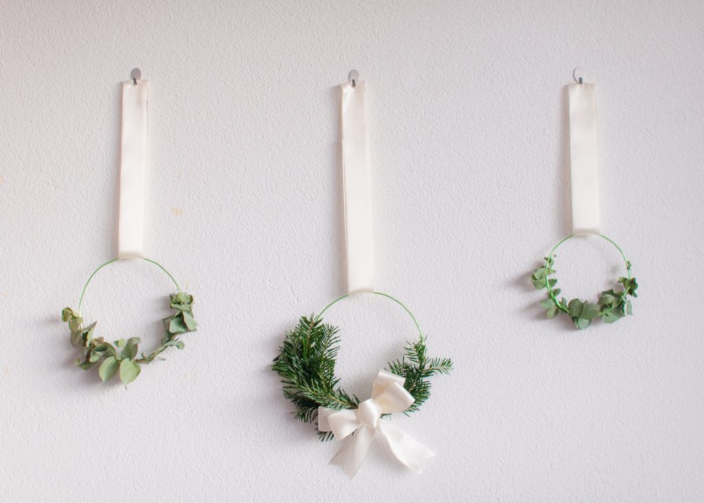 Make these Easy Minimalist Hanging Wreaths to Bring Some Extra Cheer to Your Holiday Space